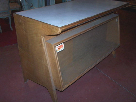 n.Bancone da negozio, dimensioni 140x65x90, anno 1950 ca., rovere, provenienza Italia