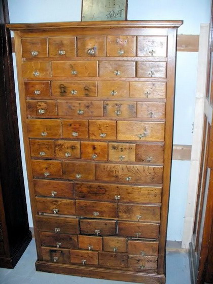 n.Cassettiera, dimensioni 87x33x155, anno primo '900 ca., rovere, provenienza Italia