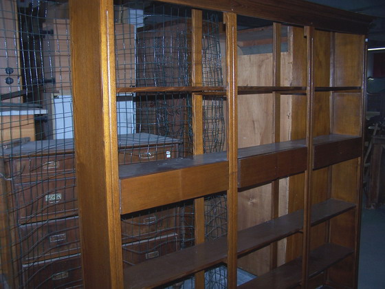 n.Libreria a cassetti, dimensioni 202x25x198, anno 1940 ca., rovere, provenienza Italia